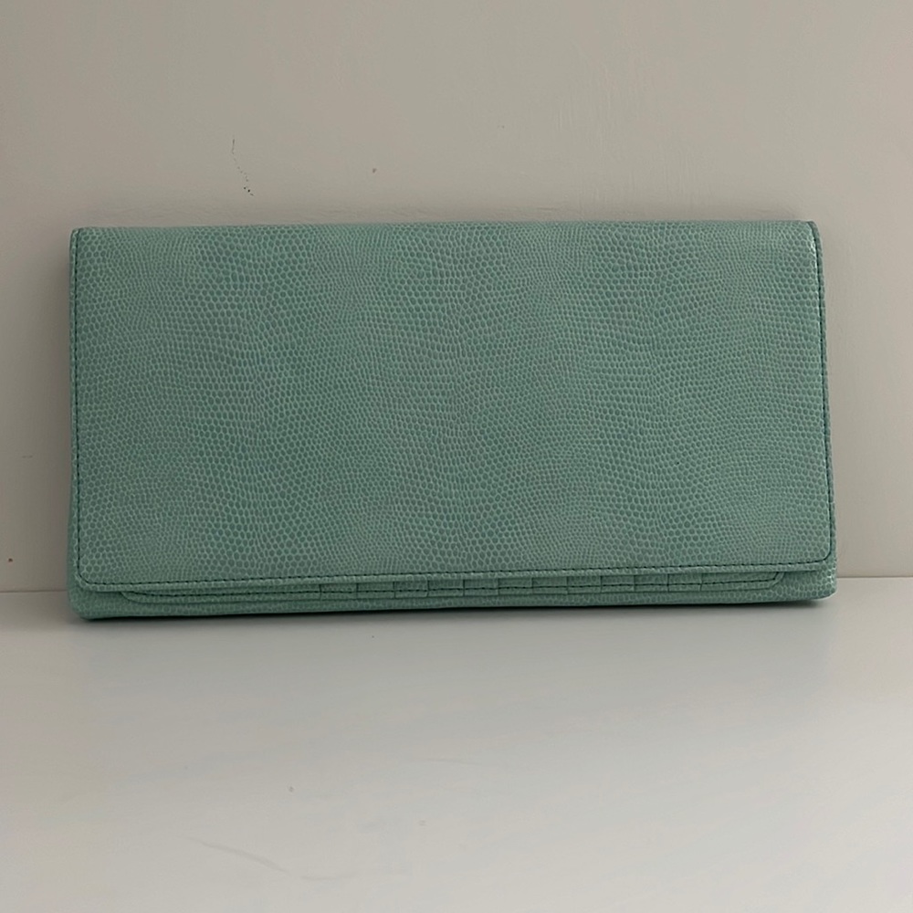 Light green textured clutch